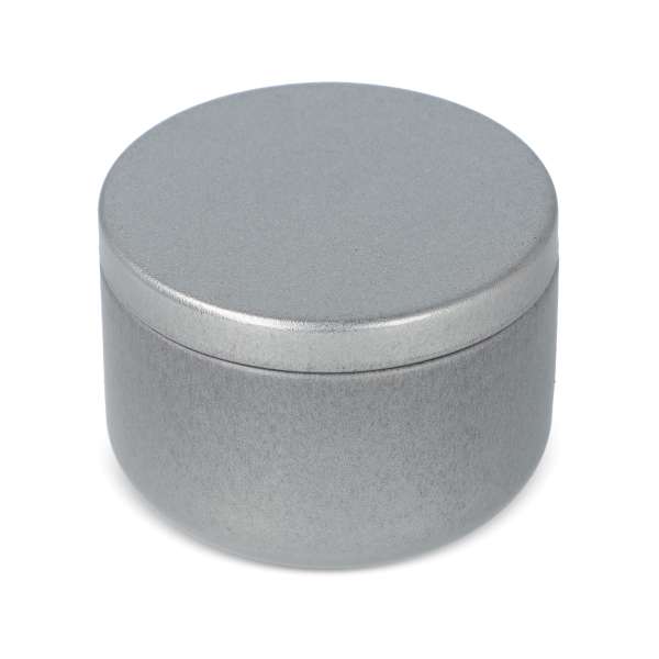Candle in round recycled tin